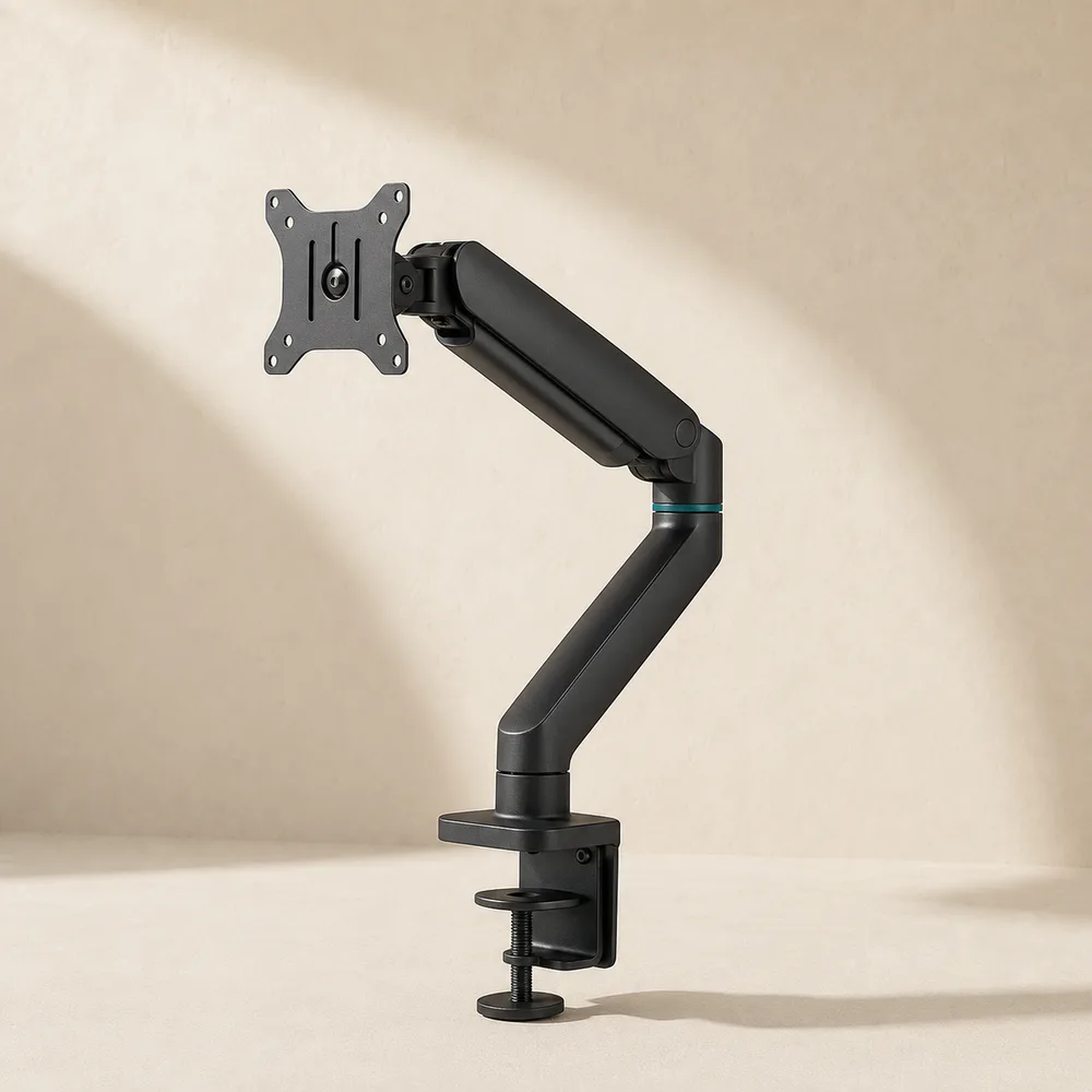 Monitor arm arranged on a clean workspace